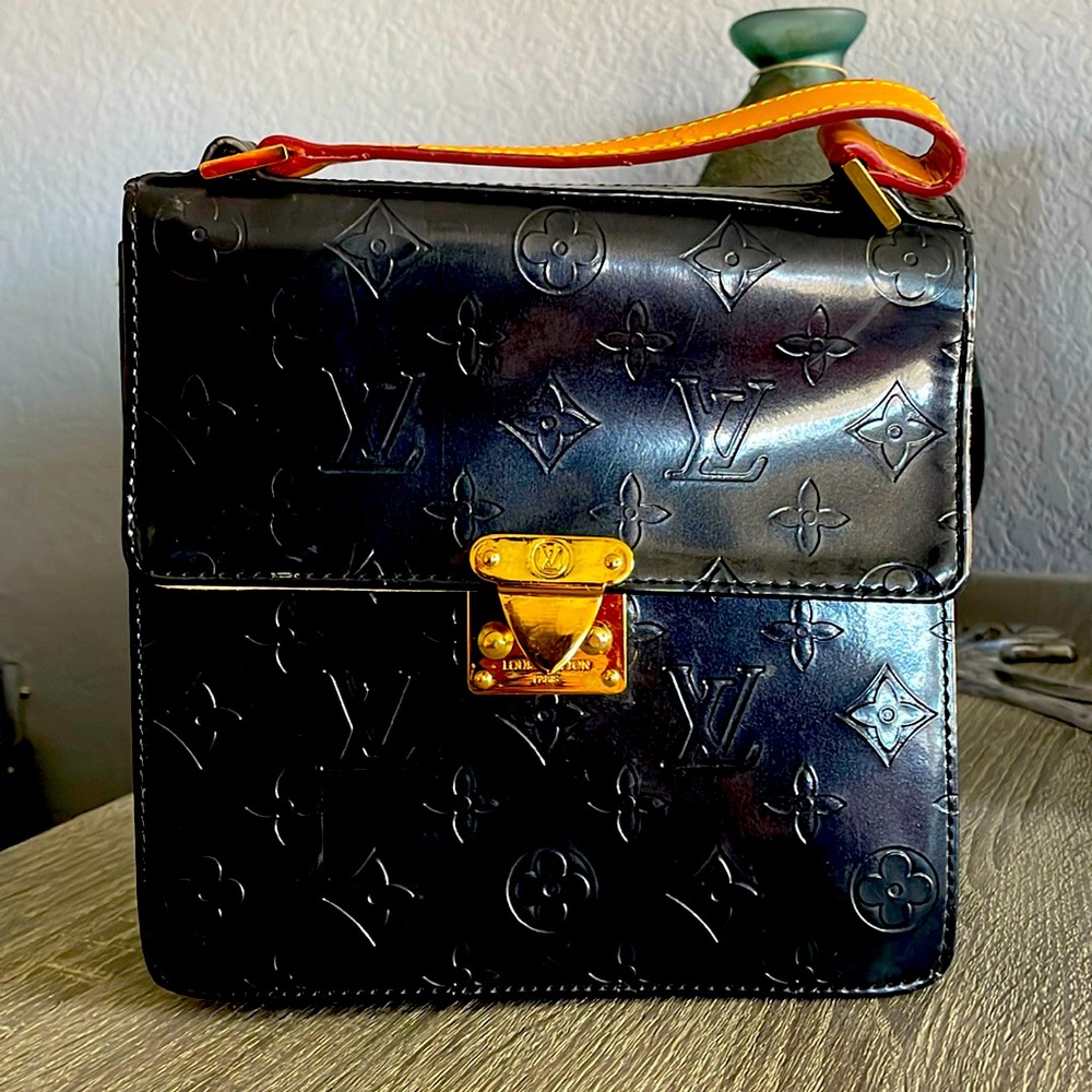 Louis Vuitton black and gold handbag